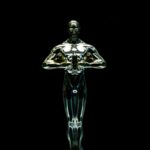 A golden trophy statue isolated on a black background symbolizing achievement and victory.